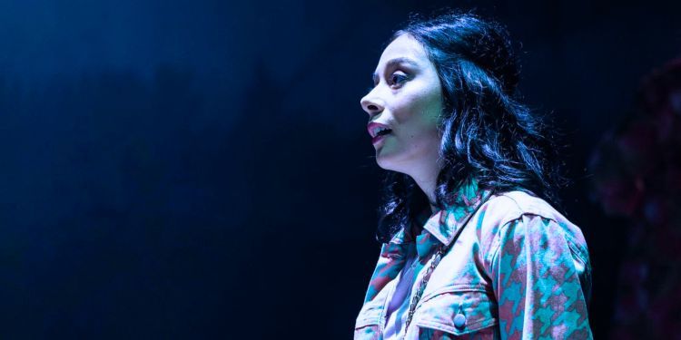 Guildhall singer in blue light