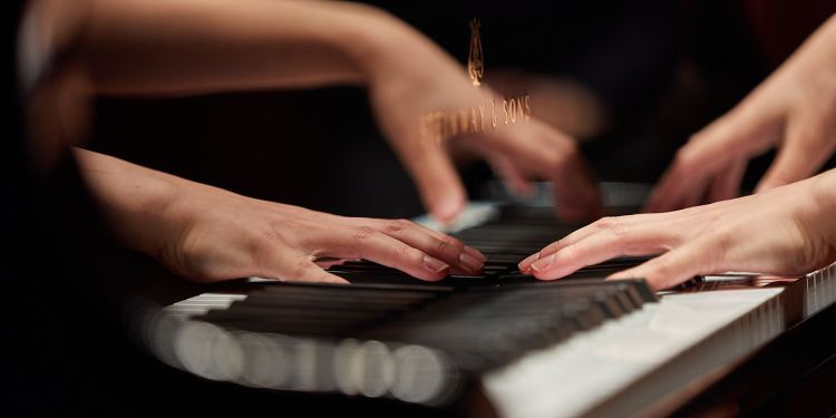 Student playing the piano