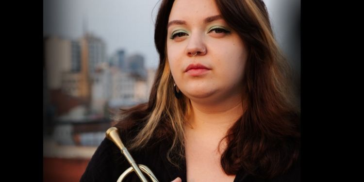 Alexandra Ridout holding trumpet.jpg