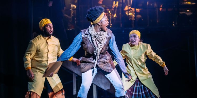Three BA Acting student performing on stage
