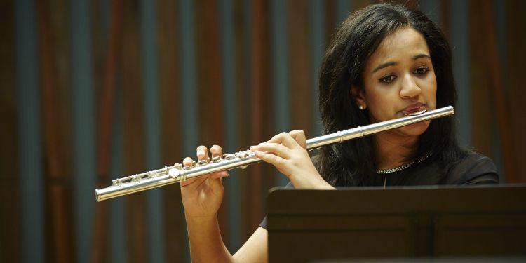 Student playing the flute