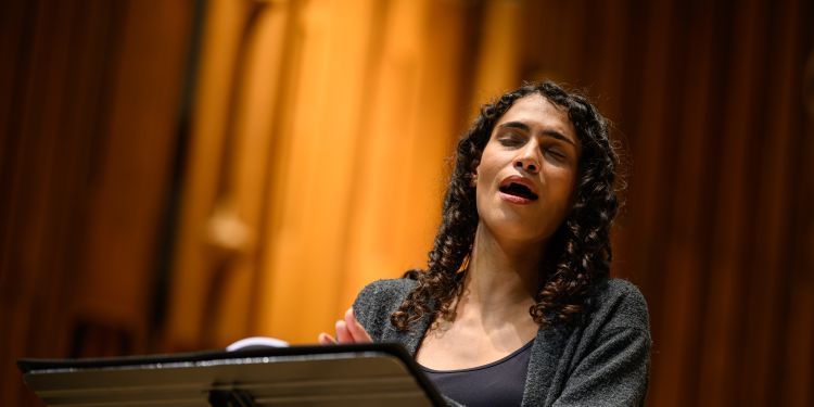 Vocal student on stage singing