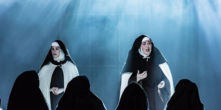 opera students in costume as nuns on stage as part of Poulenc’s Dialogues des Carmélites