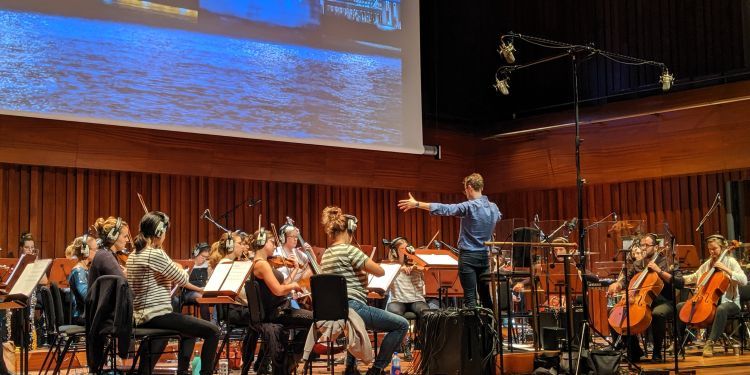 Orchestra on stage performing