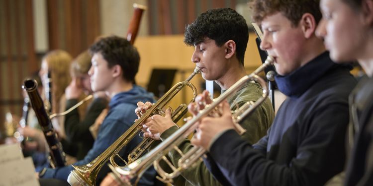 Junior Guildhall students playing brass instruments