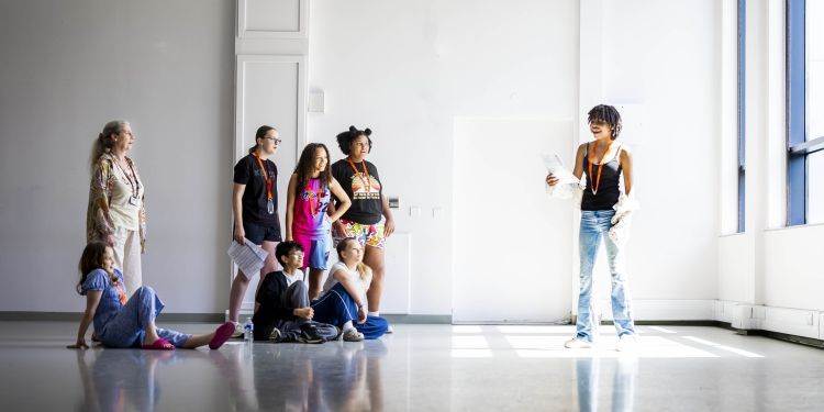 GYA students rehearsing drama in school hall