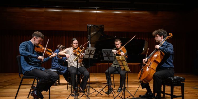 Chamber festival students on stage performing at Milton Court