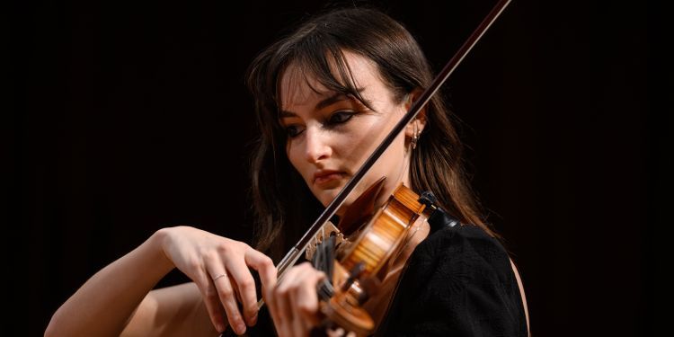 Student playing the violin