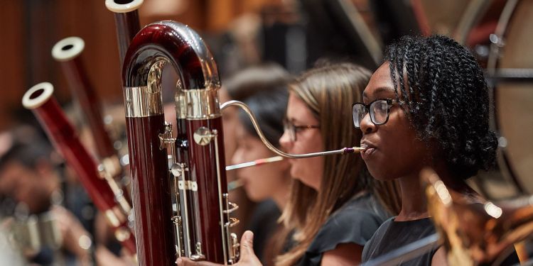 Bassoon students sat next to one another in the wind orchestra 