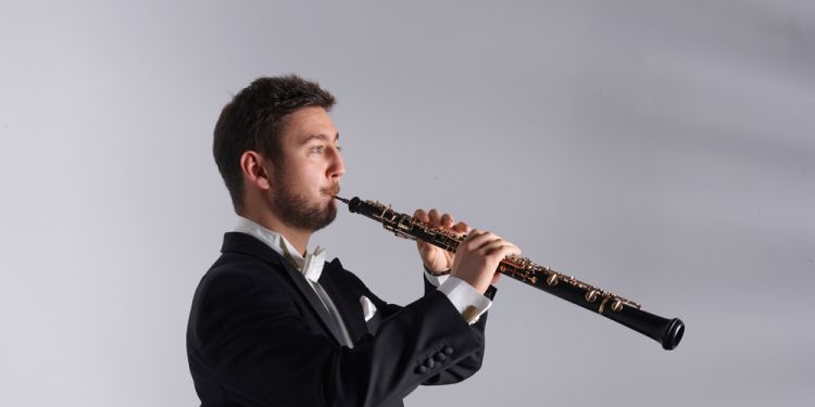 Philippe Tondre playing the oboe
