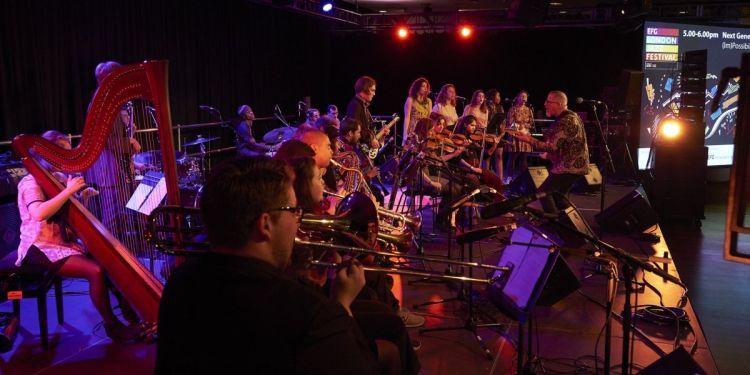 Impossibilities band on stage performing
