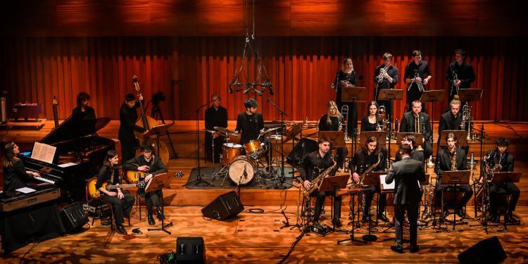 Guildhall Big Band on stage performing at Milton Court