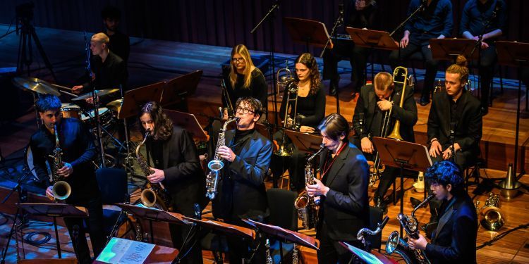 Big band on stage performing