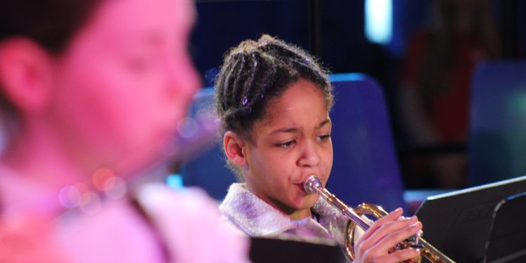 Student playing a trumpet 