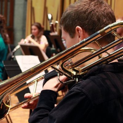 Trombone and wind players during an Ubu Ensemble rehearsal