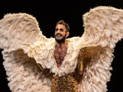 Man in bird costume performing in Judas Iscariot
