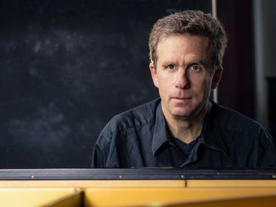 man looking at camera wearing black shirt