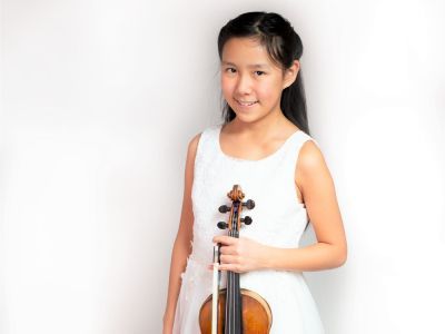 image of student holding a violin