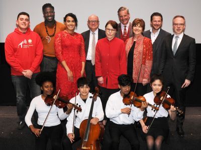 image of students and staff smiling at camera