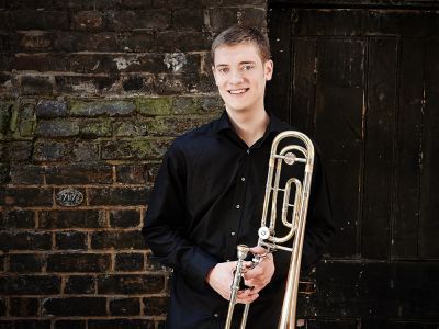 Peter Moore holding instrument