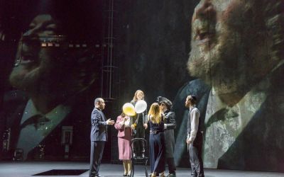 Image of actors on stage during performance