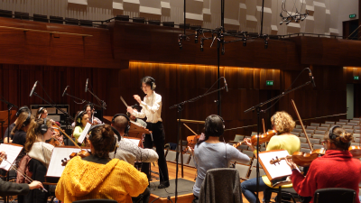 Student conducting an orchestra #2