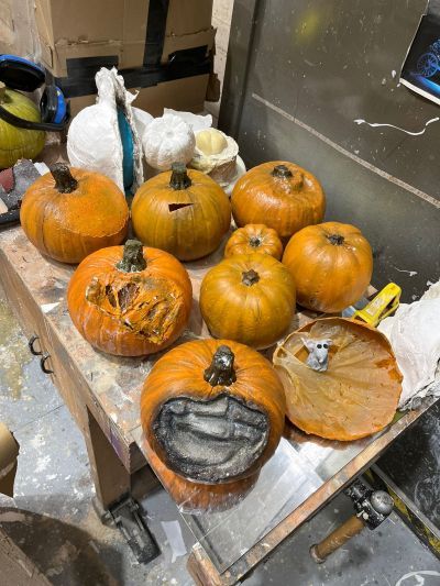 Real and fake pumpkins for a stage set