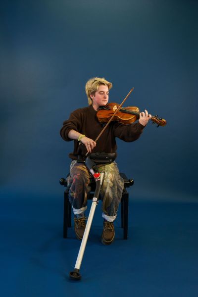 Cass holding his viola