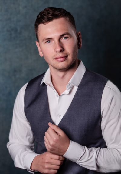 Headshot of Redmond Sanders