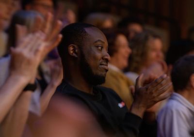 Guildhall audience members clapping