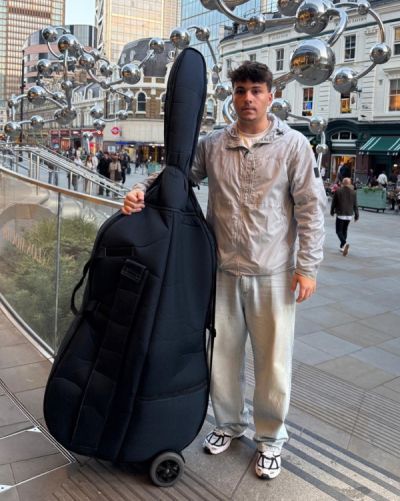 Eduardo posing with his double bass