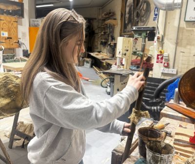 Design Realisation student El green working on prop for Pirate themed film set.