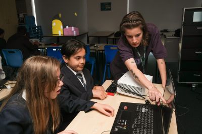 School pupils are instructed on video mapping software by Roadshow facilitator